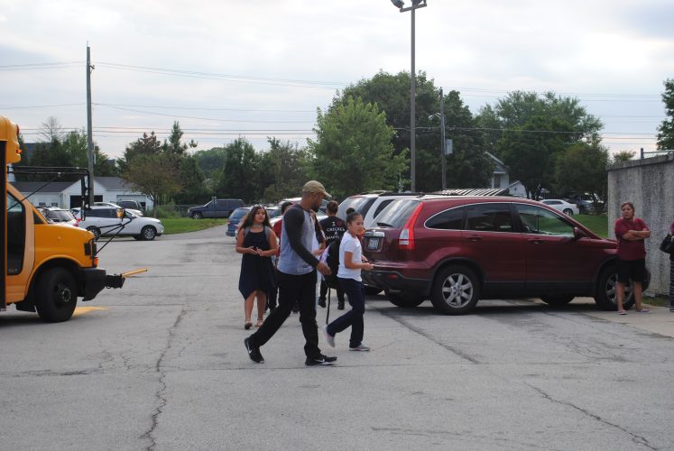 Students walking to line up.