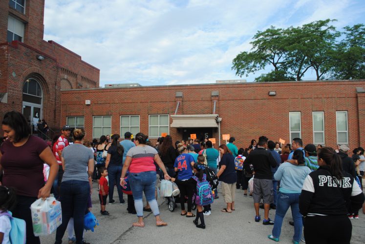 Students lined up with their teacher.