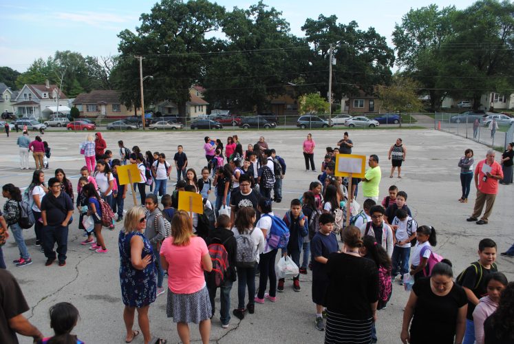 Students lined up with their teacher.